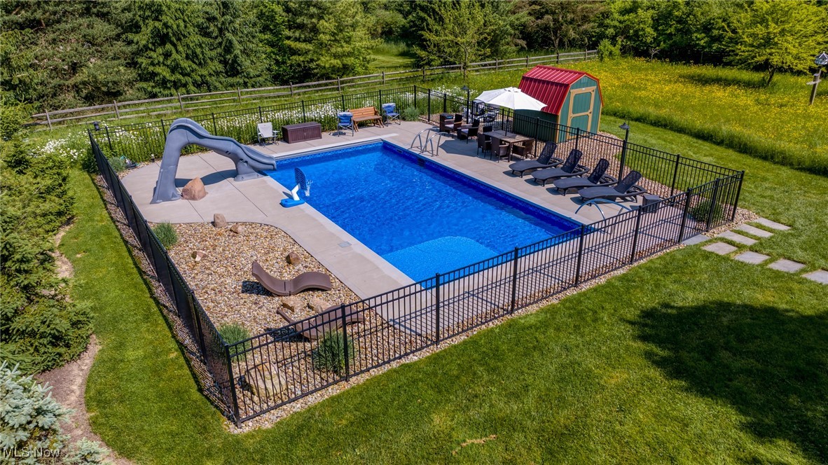 1350 Bell Road Chagrin Falls, OH 44022 - Photo 6 of 46 36 x 18' gas heated pool & automatic cover