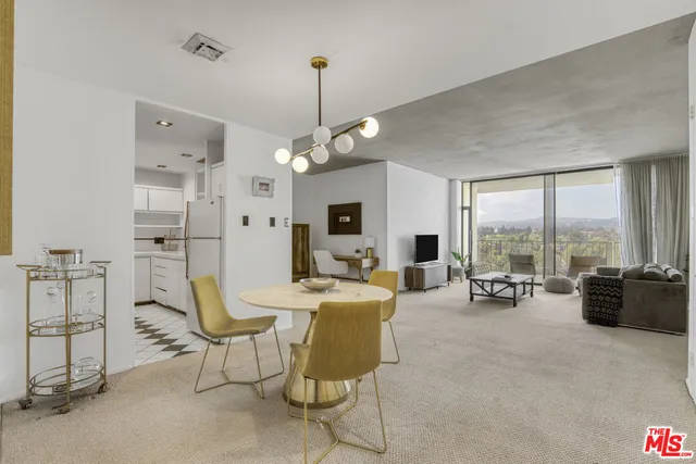 a view of a livingroom with furniture window and outside view
