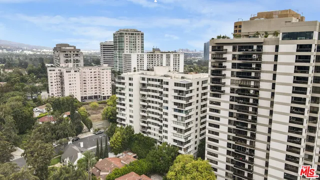 a view of a city with tall buildings