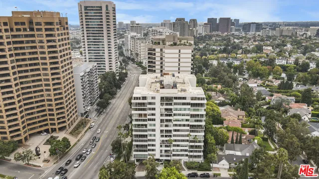 a view of a city with tall buildings