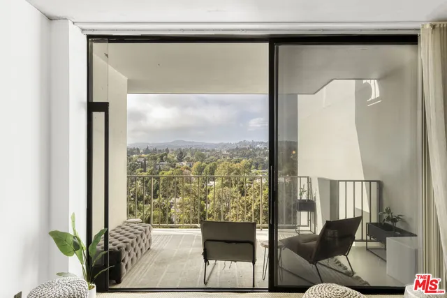 a view of a living room and a window