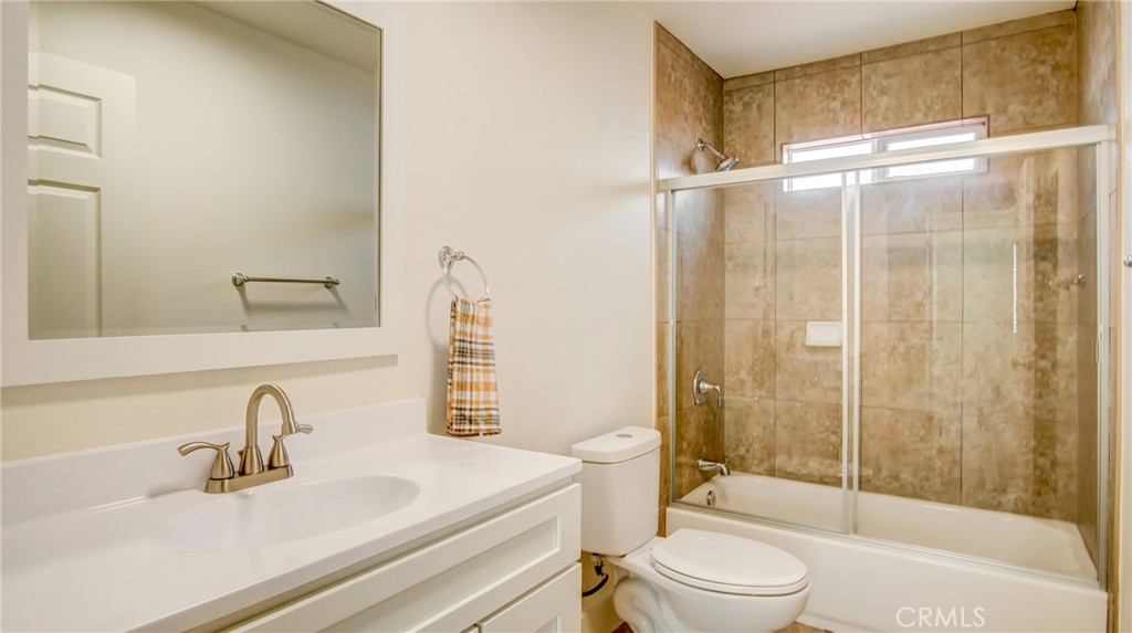 330 East 101st Street Los Angeles, CA 90003 - Photo 12 of 15 a bathroom with a sink toilet and shower