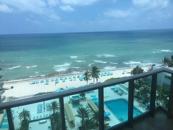 a view of a lake in middle of the ocean