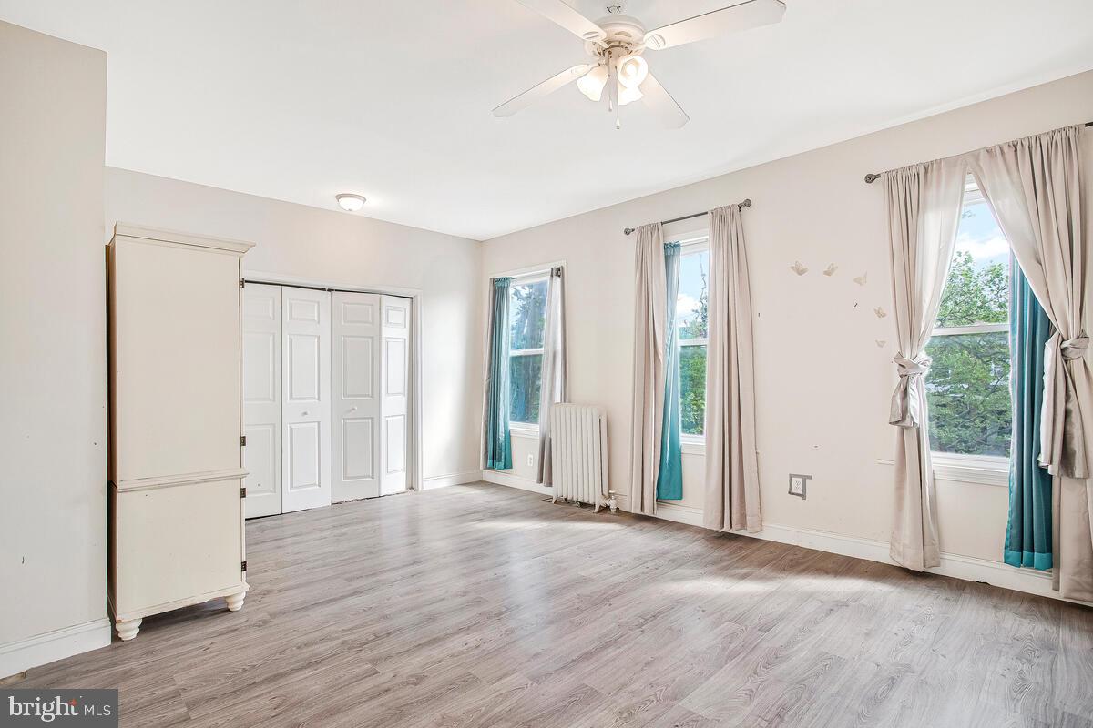 3516 Reisterstown Road Baltimore, MD 21215 - Photo 10 of 21 a view of entryway with wooden floor