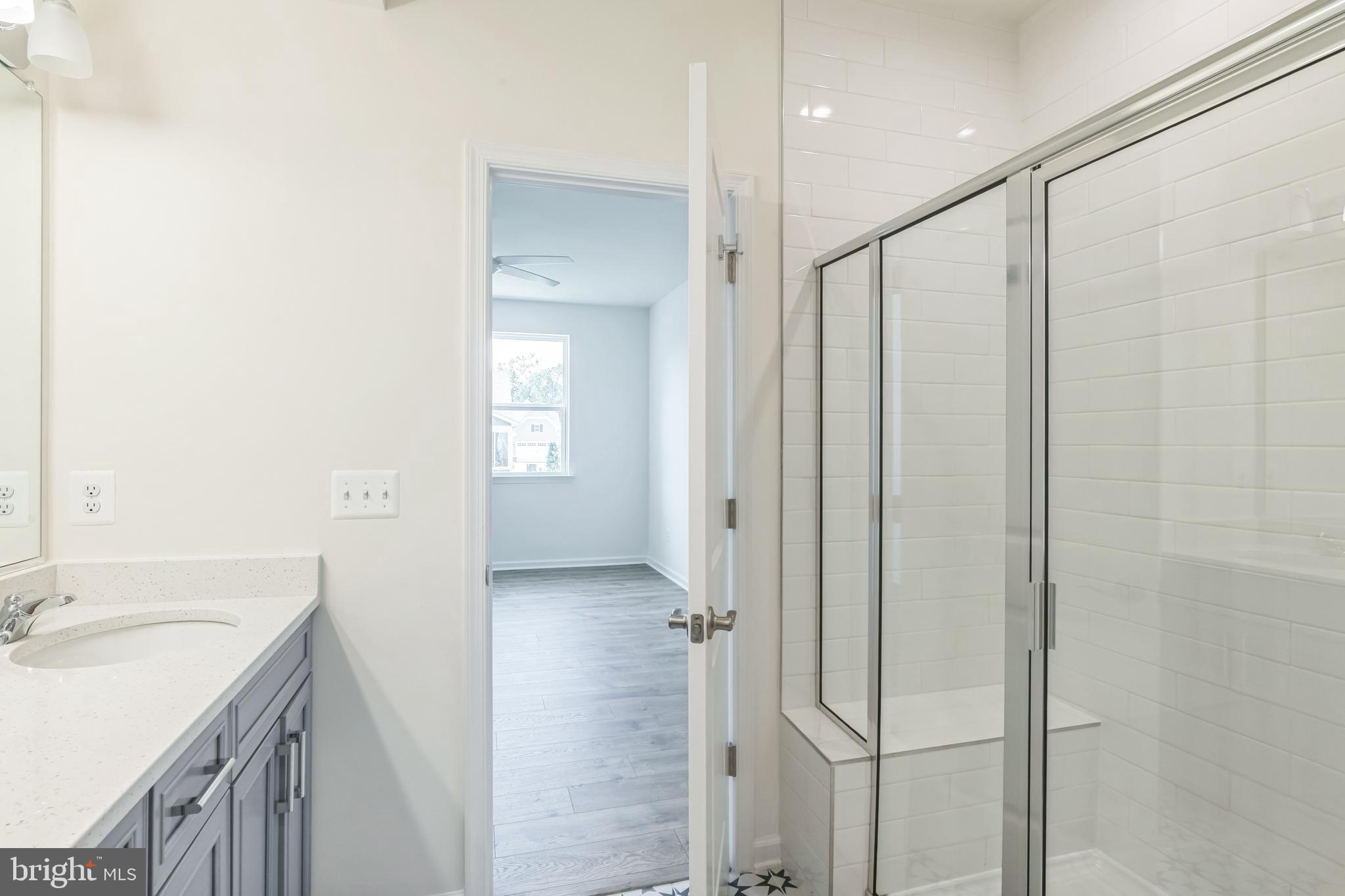 390 Scranton Lane Ocean View, DE 19970 - Photo 10 of 15 a bathroom with a sink and a mirror