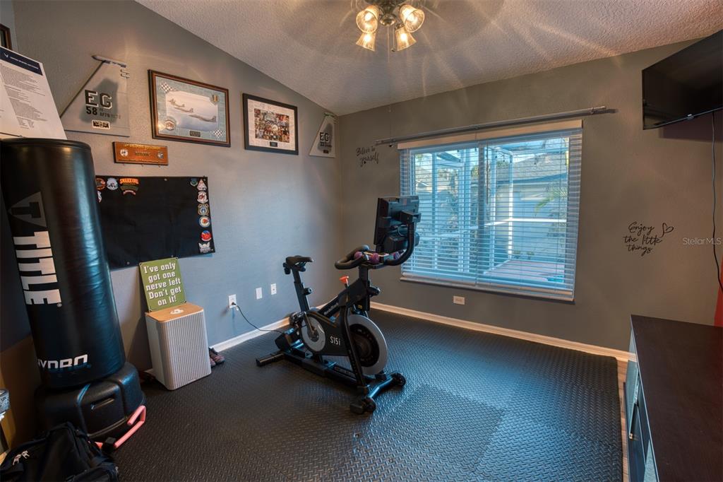 4303 Orange Ridge Court Valrico, FL 33596 - Photo 27 of 40 a view of a workspace with furniture and a window