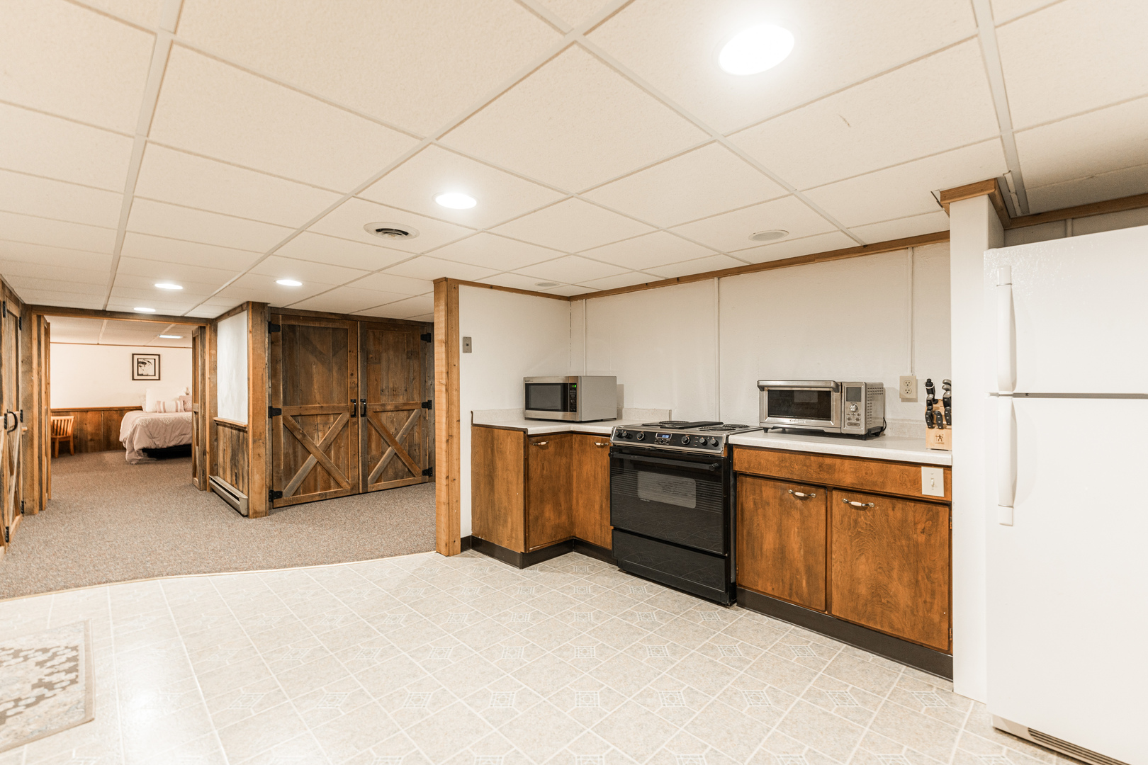 1N409 County Line Road Maple Park, IL 60151 - Photo 56 of 125 a kitchen with stainless steel appliances granite countertop a sink refrigerator and cabinets
