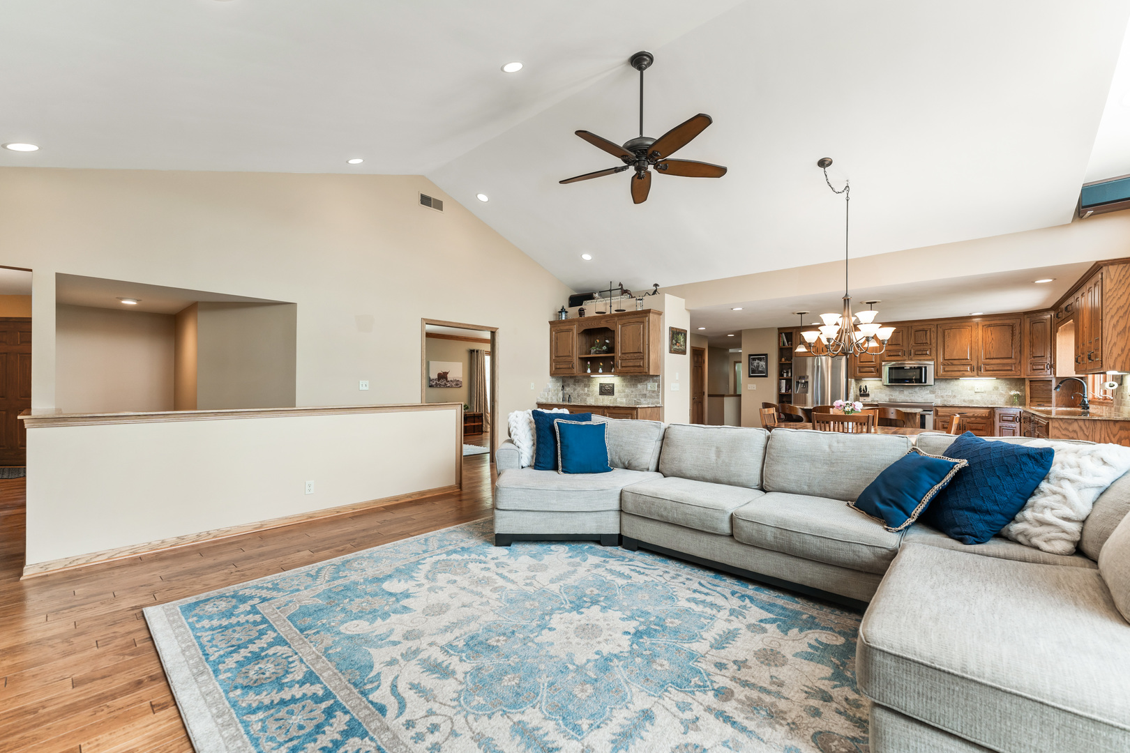 1N409 County Line Road Maple Park, IL 60151 - Photo 8 of 125 a living room with furniture and a chandelier