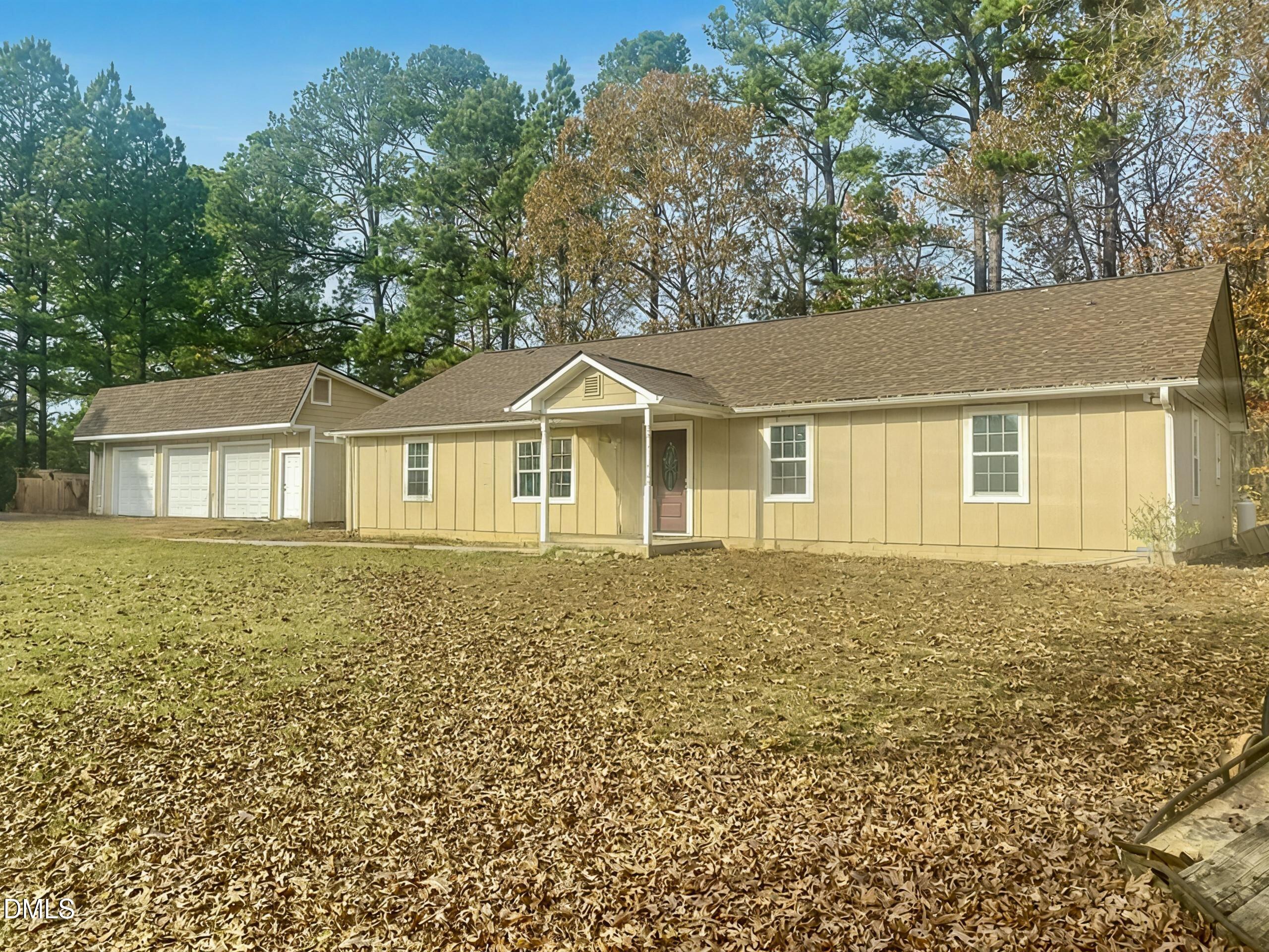 3182 Sims Bridge Road Kittrell, NC 27544 - Photo 1 of 44 a view of a house with a yard