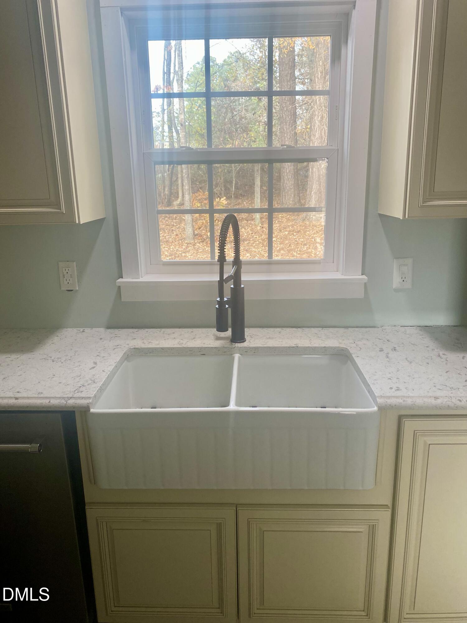 3182 Sims Bridge Road Kittrell, NC 27544 - Photo 14 of 44 a close view of sink and cabinets