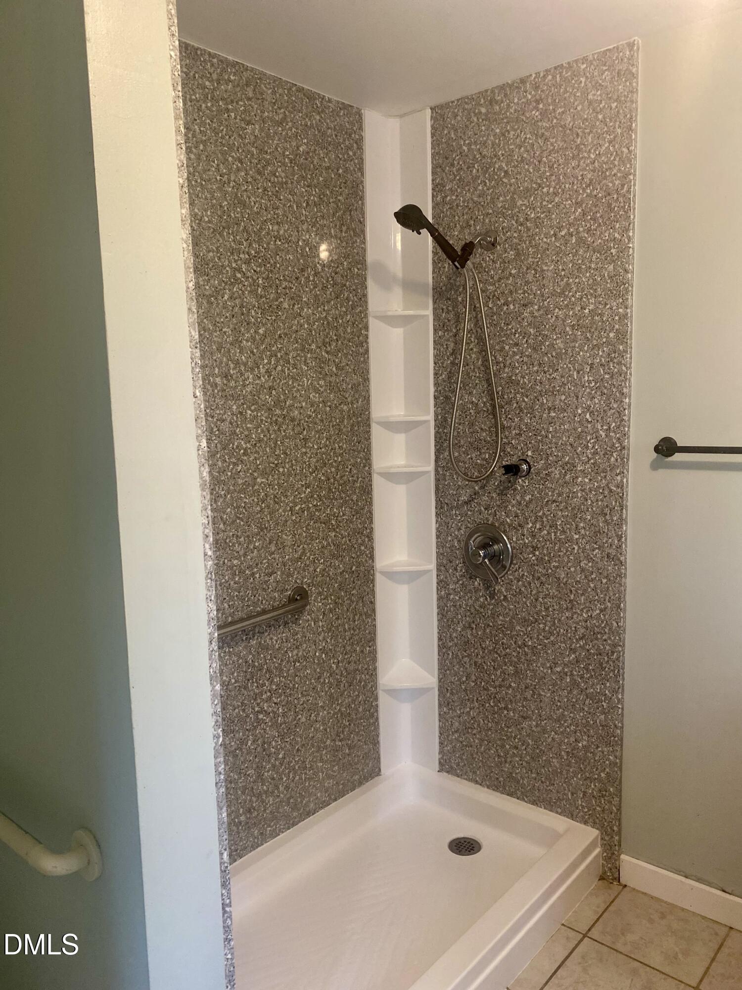 3182 Sims Bridge Road Kittrell, NC 27544 - Photo 30 of 44 a bathroom with a shower