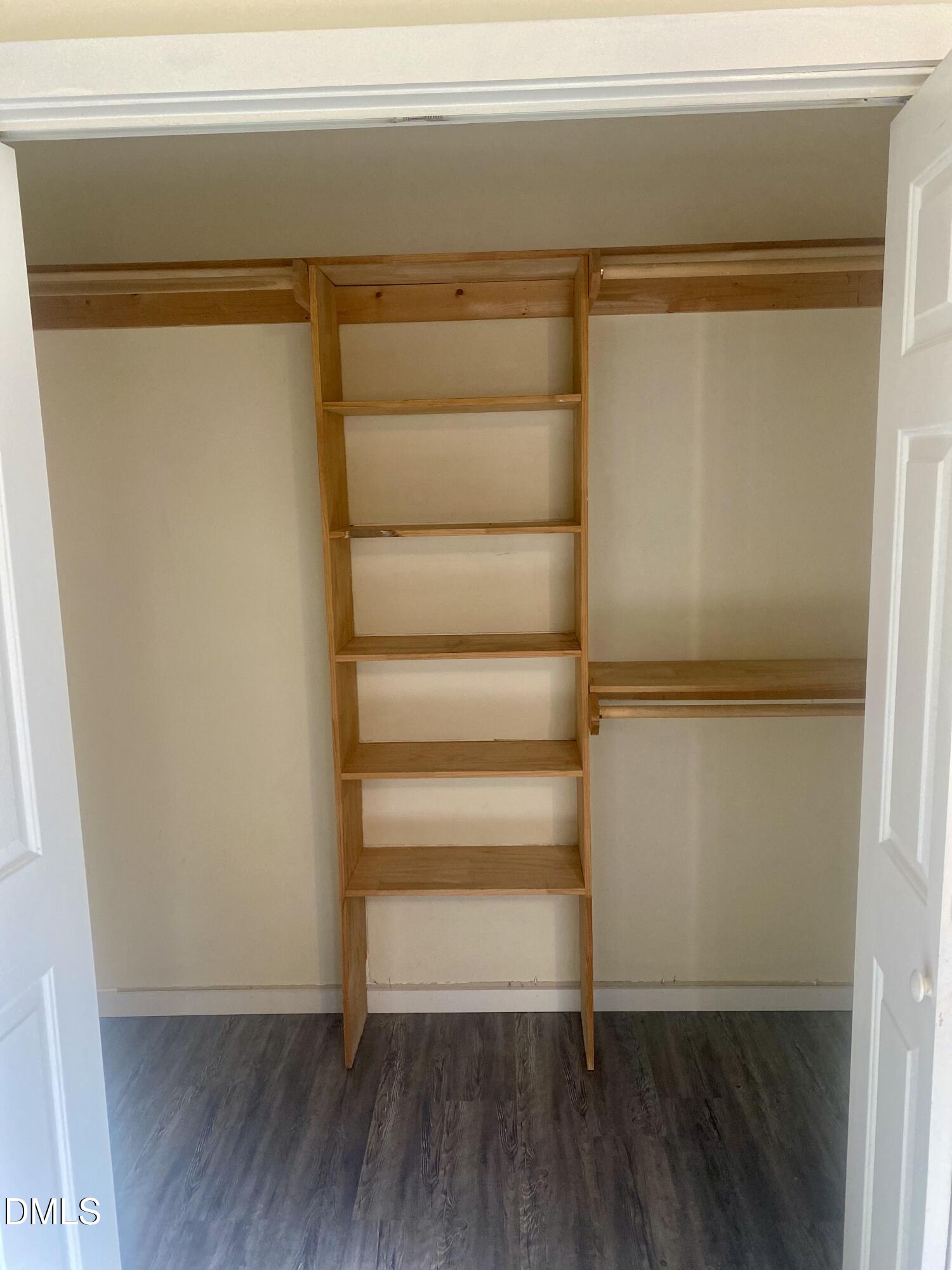 3182 Sims Bridge Road Kittrell, NC 27544 - Photo 35 of 44 a view of walk in closet with empty racks