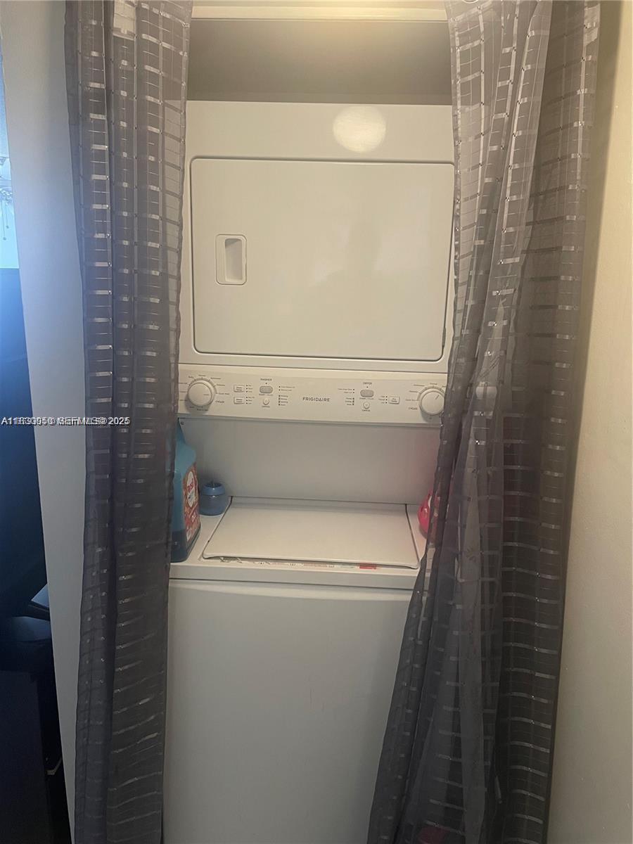 3399 Foxcroft Road, Unit 315 Miramar, FL 33025 - Photo 7 of 9 a close up view of a washer and dryer