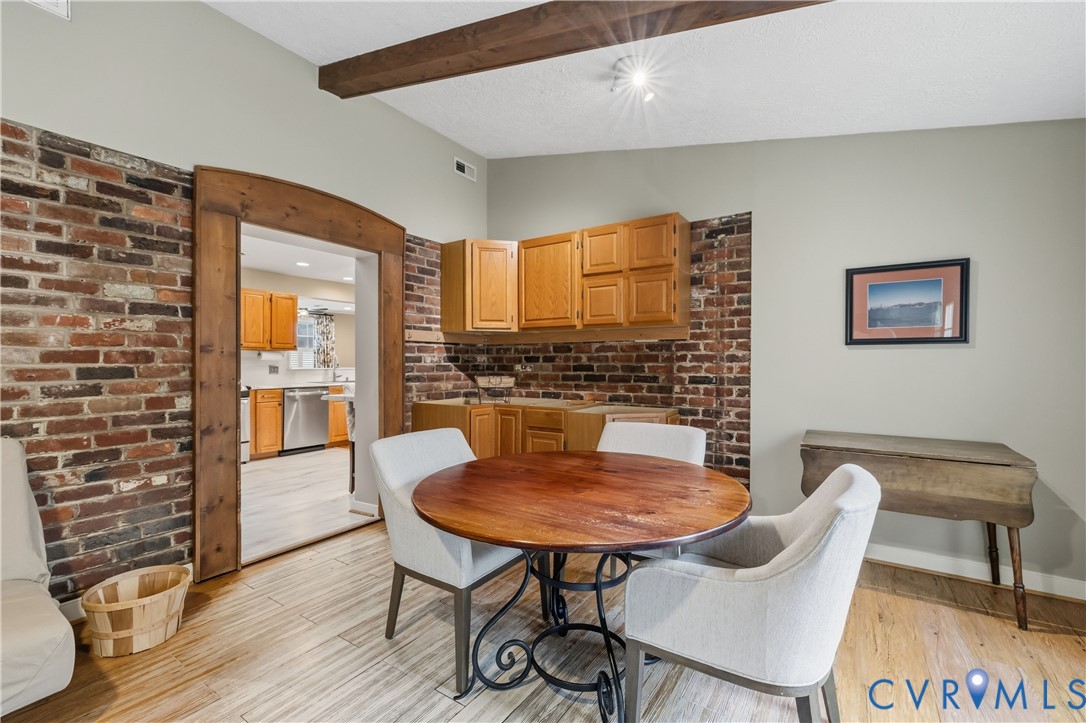 5800 West Rois Road Richmond, VA 23227 - Photo 12 of 32 a dining room with furniture and window
