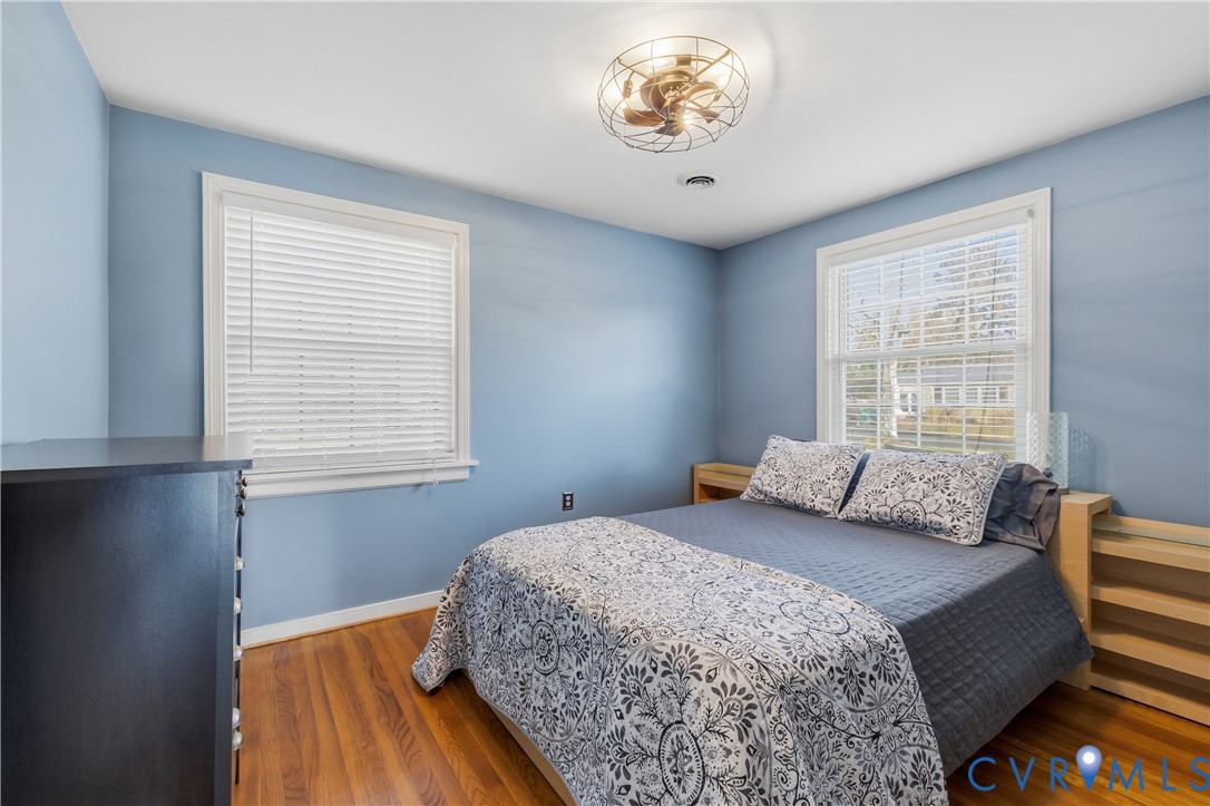 5800 West Rois Road Richmond, VA 23227 - Photo 22 of 32 a bedroom with a bed and a window
