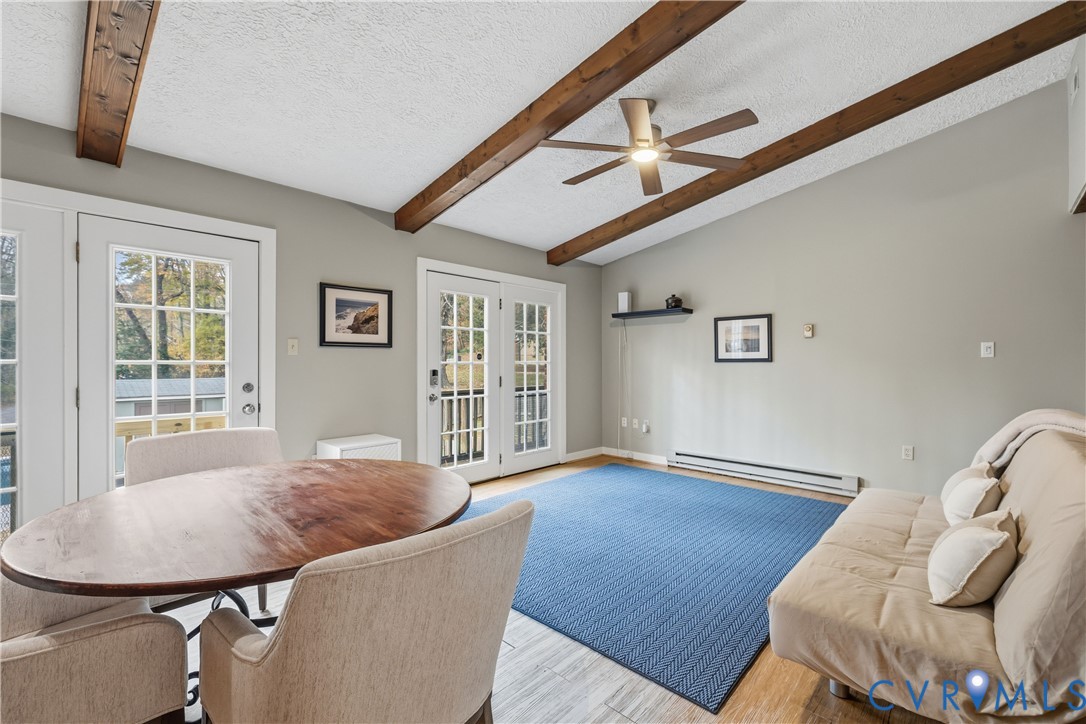 5800 West Rois Road Richmond, VA 23227 - Photo 10 of 32 a living room with furniture and a window