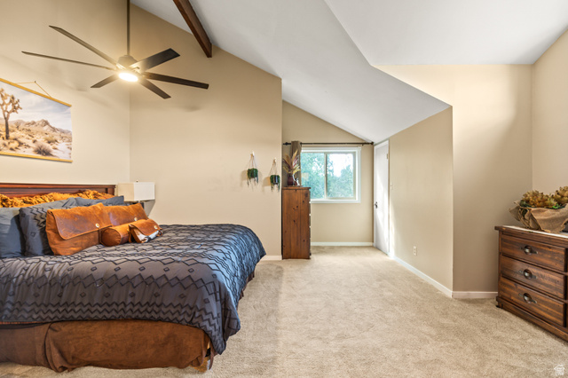 460 Omni Point Road Central Valley, UT 84754 - Photo 61 of 101 Carpeted room featuring a vaulted ceiling with exposed wood beams, a modern ceiling fan, and a window with a white trim