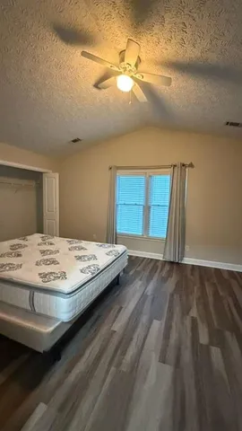 an aerial view of a house with swimming pool