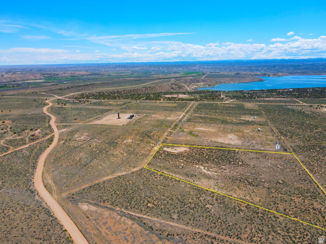 4500 South 22750th Duchesne, UT 84021 - Photo 18 of 34 Expansive undeveloped land featuring a significant body of water in the background