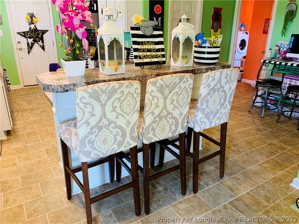1000 Rowan Road Lumberton, NC 28358 - Photo 19 of 41 a view of a dining room with furniture