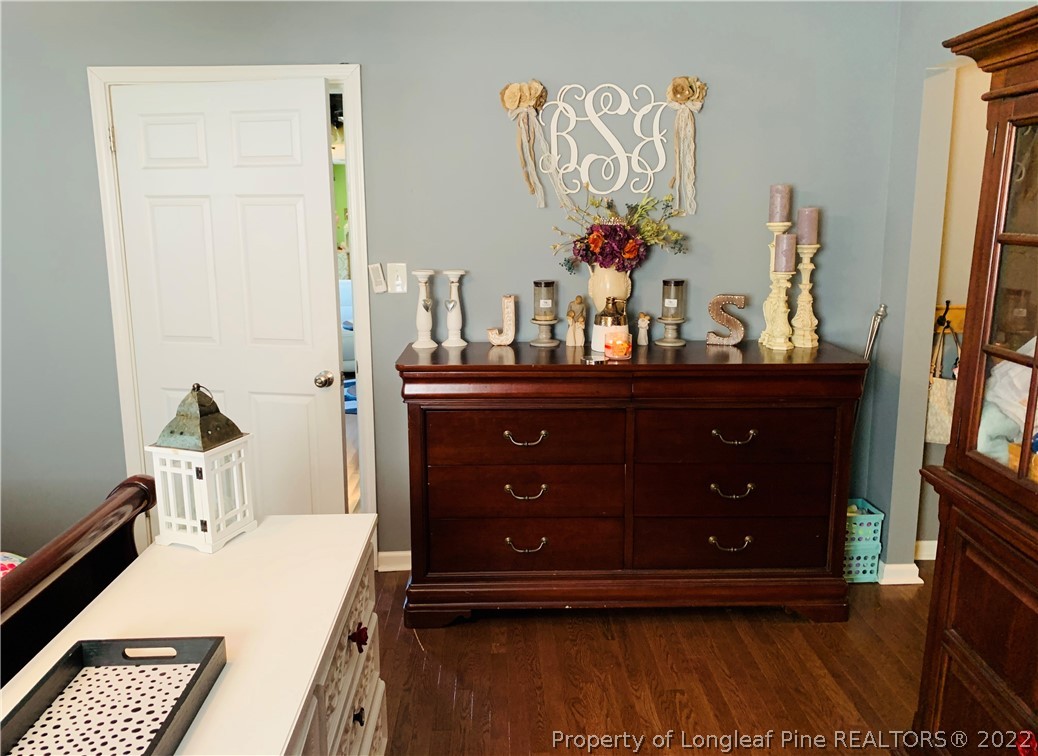 1000 Rowan Road Lumberton, NC 28358 - Photo 22 of 41 a bed room with a bed and a dresser