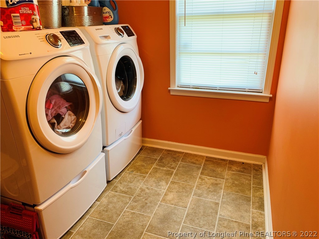 1000 Rowan Road Lumberton, NC 28358 - Photo 35 of 41 a view of a storage & utility room with a washer dryer