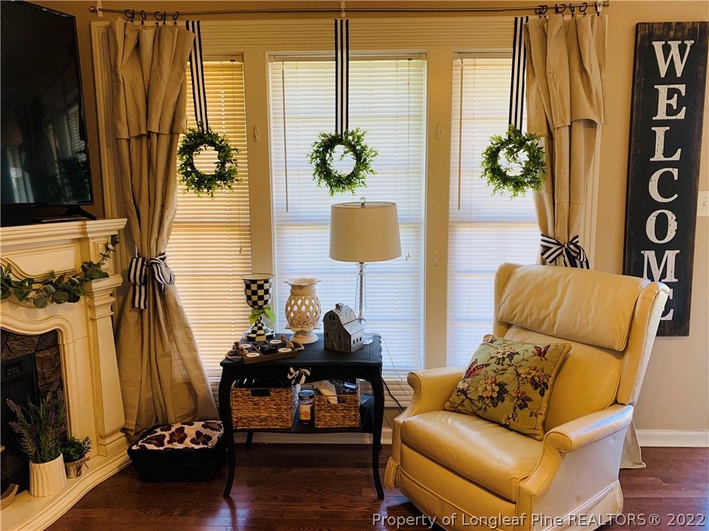 1000 Rowan Road Lumberton, NC 28358 - Photo 6 of 41 a living room with furniture and a flat screen tv