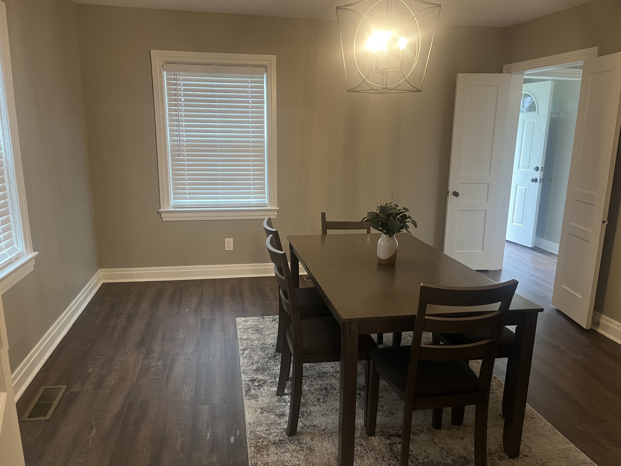 107 West Songer Street Waynesboro, TN 38485 - Photo 11 of 26 a view of a dining room with furniture and wooden floor