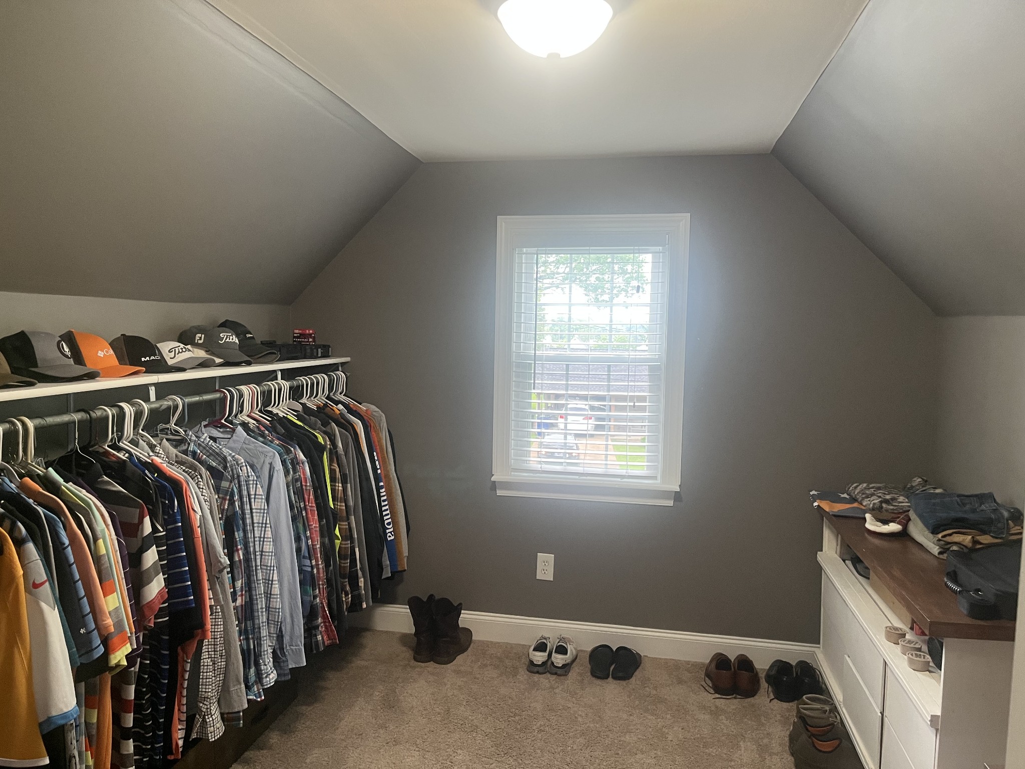 107 West Songer Street Waynesboro, TN 38485 - Photo 20 of 26 a view of walk in closet with clothes and shoes