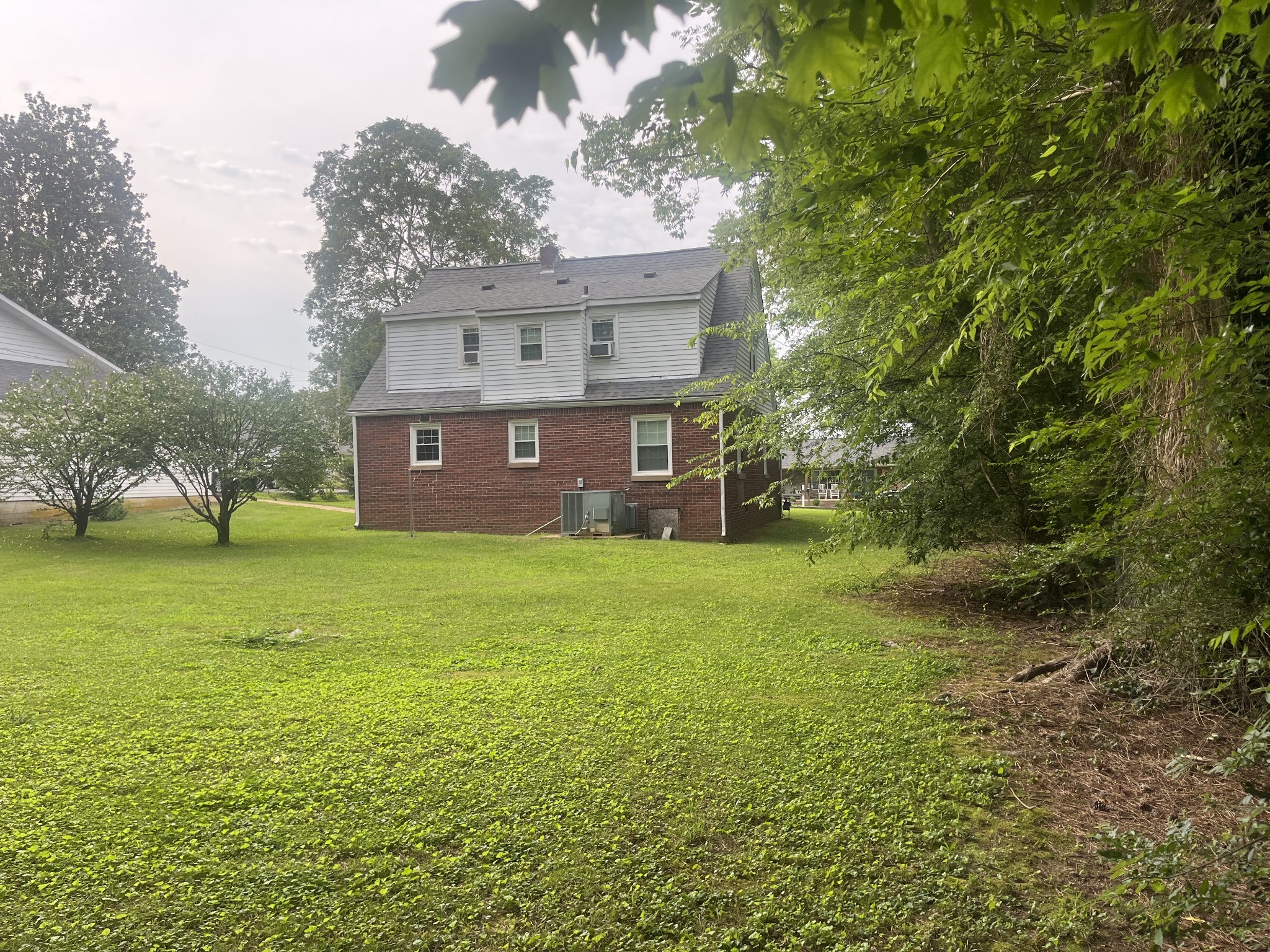 107 West Songer Street Waynesboro, TN 38485 - Photo 8 of 26 a view of a house with a yard