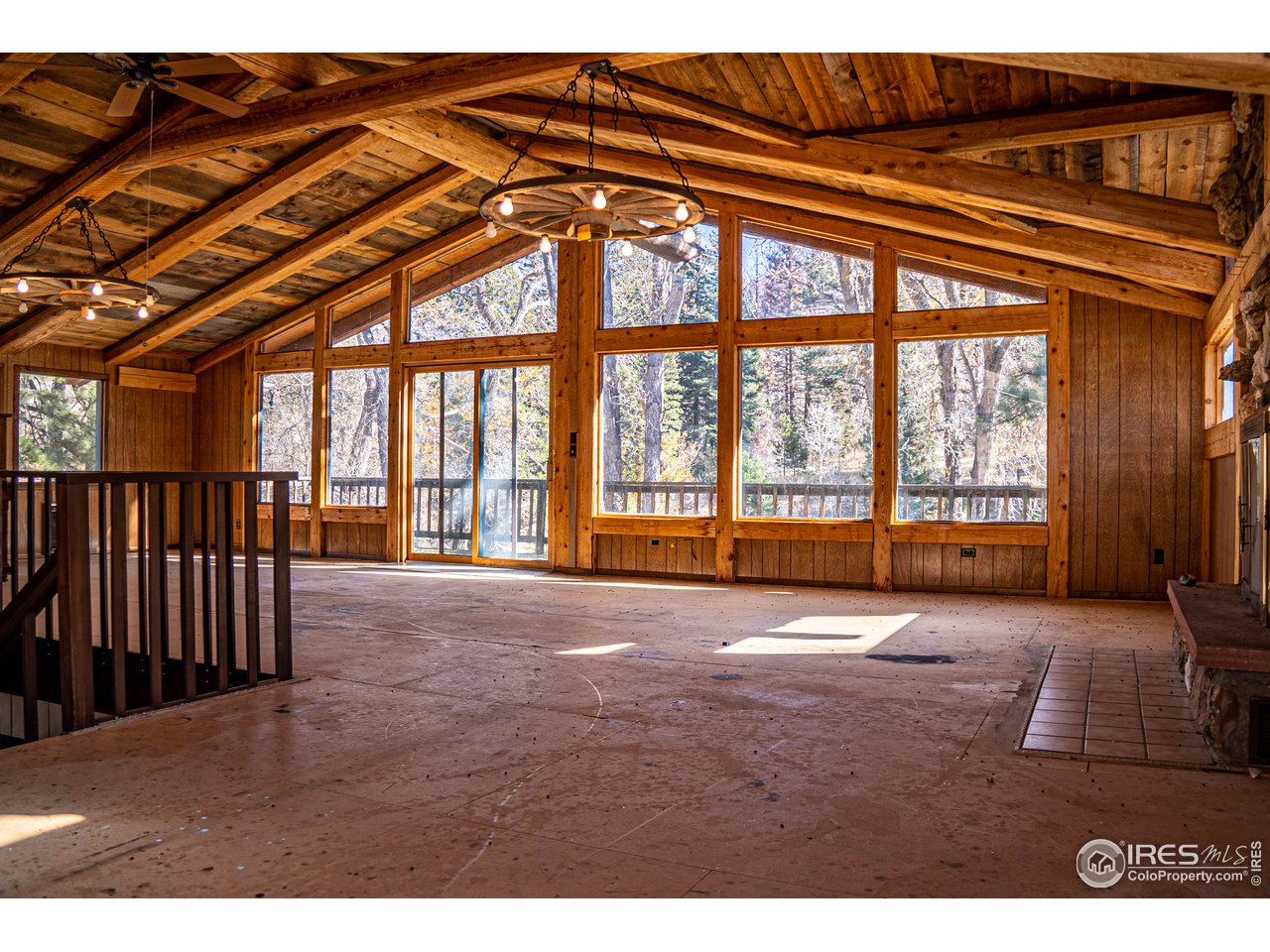 37797 Poudre Canyon Road Bellvue, CO 80512 - Photo 14 of 15 a view of an empty room with a balcony