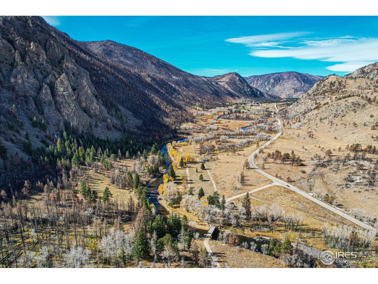 37797 Poudre Canyon Road Bellvue, CO 80512 - Photo 4 of 15 a view of a backyard