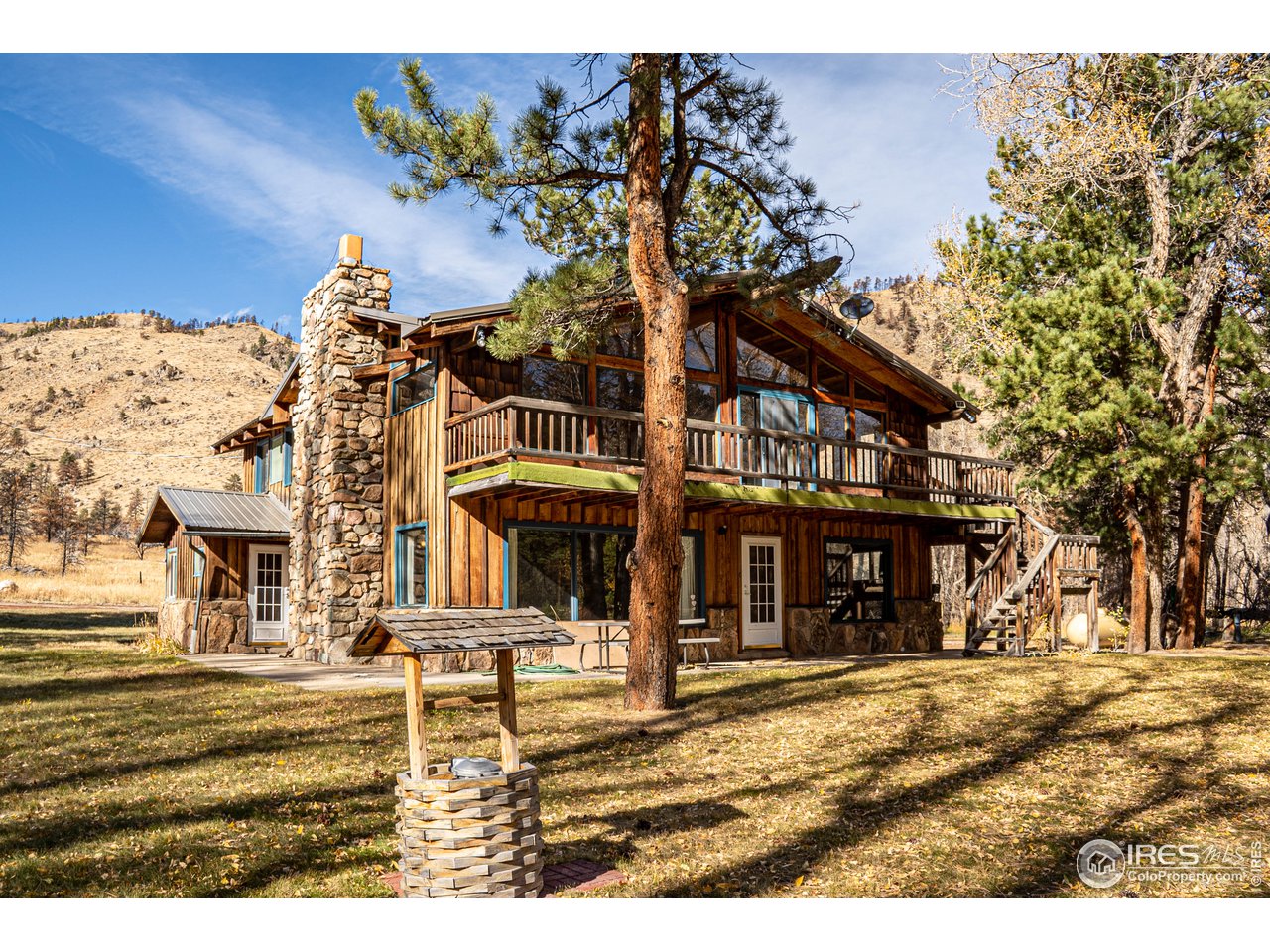 37797 Poudre Canyon Road Bellvue, CO 80512 - Photo 9 of 15 a view of a town with small houses