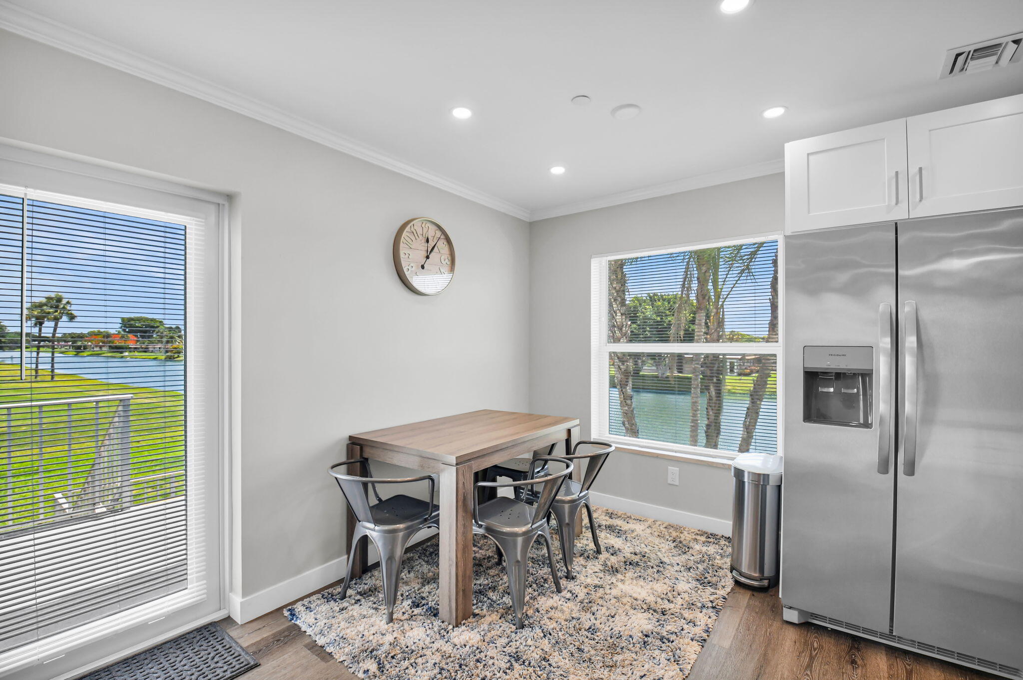 388 Tuscany Lane, Unit 388 Delray Beach, FL 33446 - Photo 9 of 40 a dining room with furniture and a window