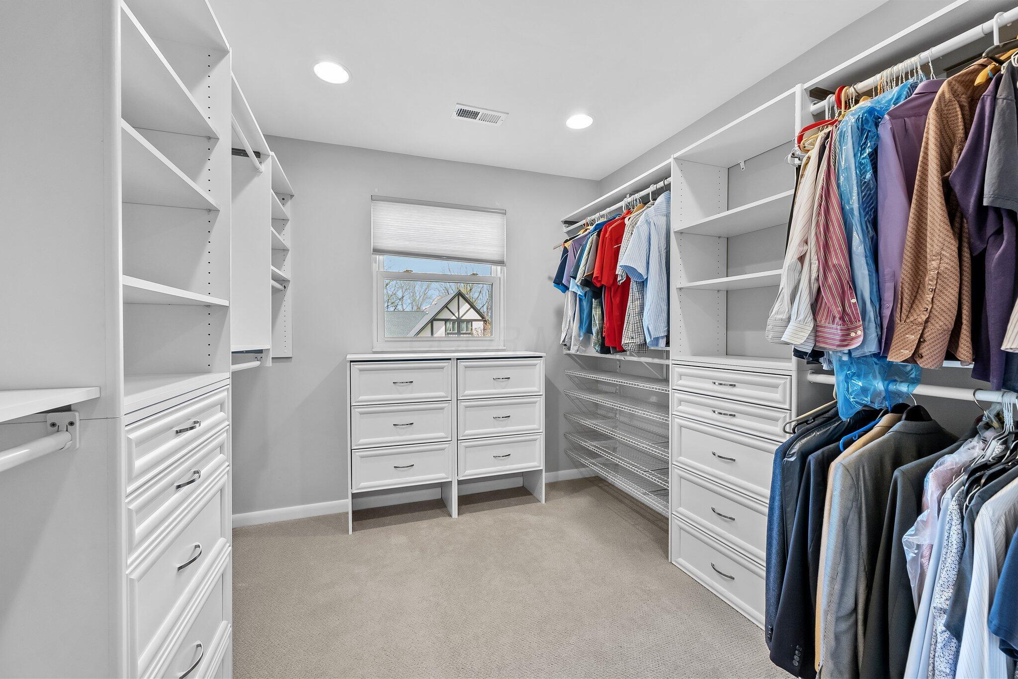 1269 Windham Road Columbus, OH 43220 - Photo 31 of 82 The primary closet is sure to impress! Wonderful hanging, drawer and storage space!