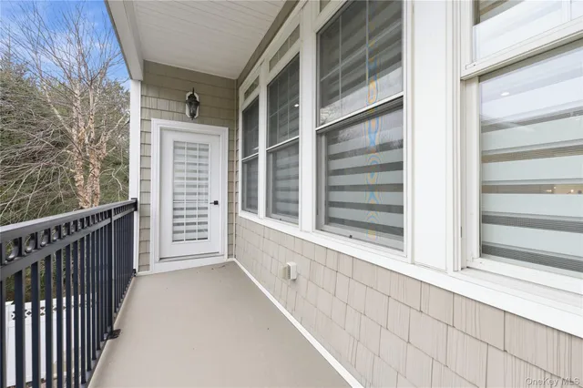 a view of a house with a large window