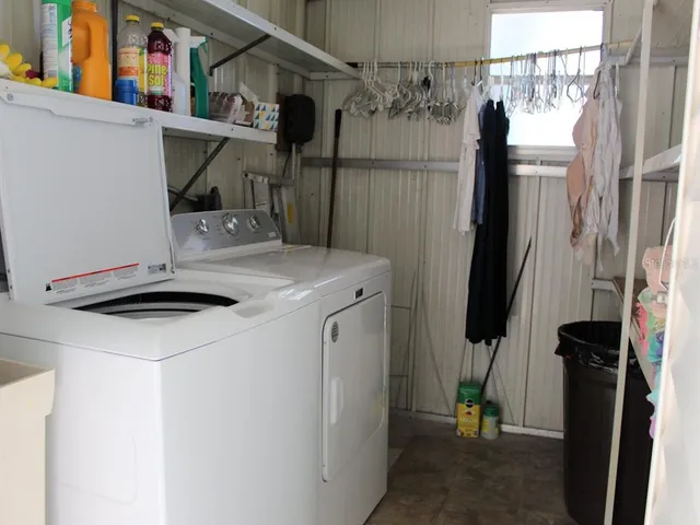 a utility room with dryer and washer