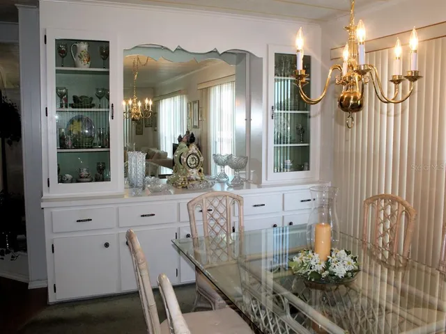 a view of hall way with mirror