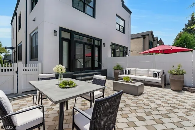 a view of a patio with furniture