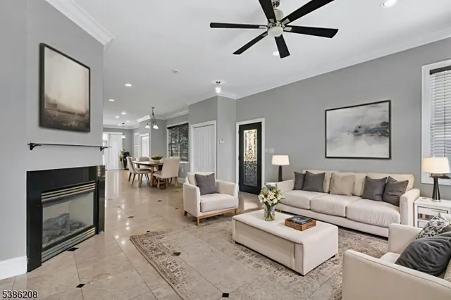 a living room with furniture a fireplace