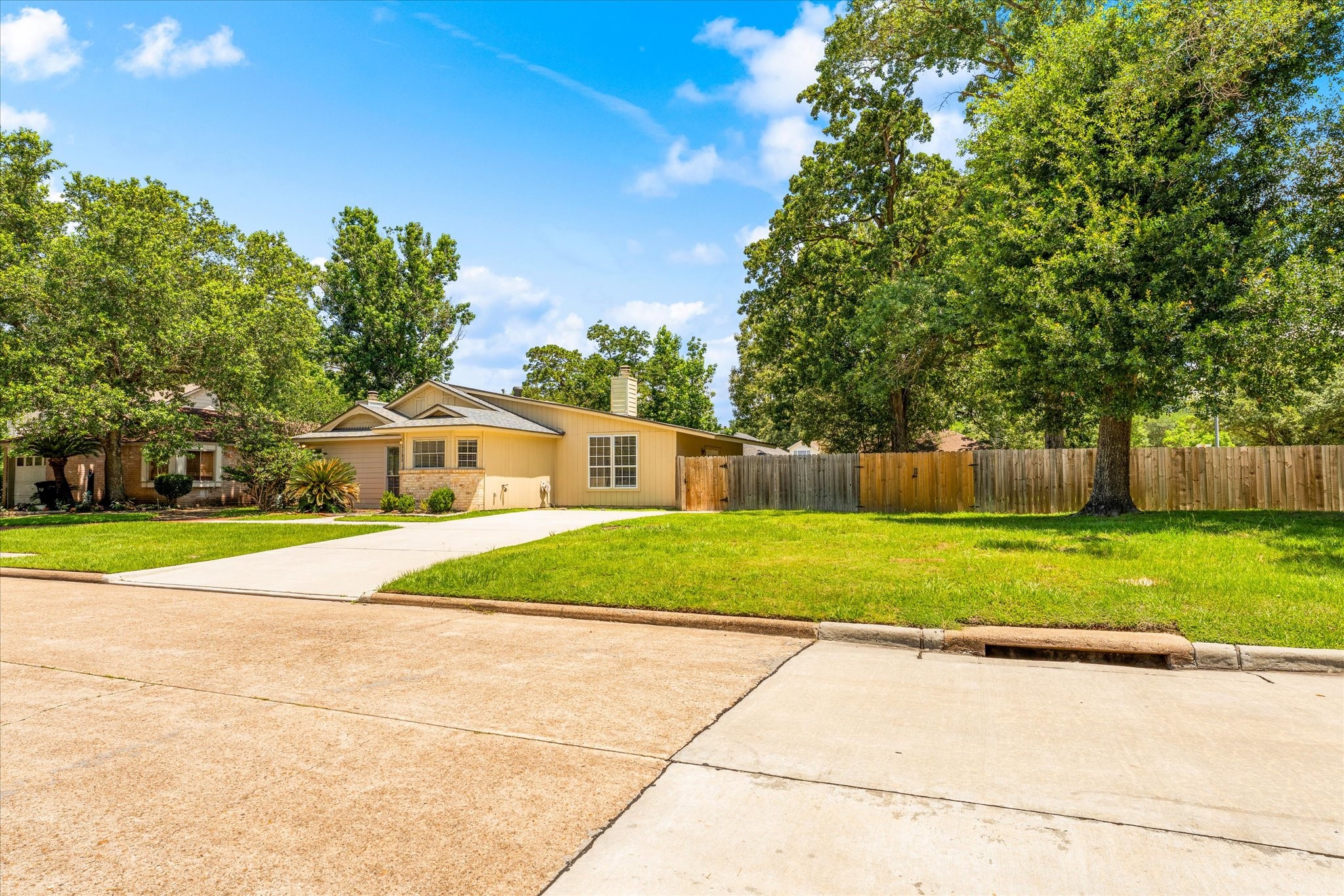 4906 Meadowfox Place Spring, TX 77389 - Photo 2 of 39 Exterior oversized gate for storage in the backyard.