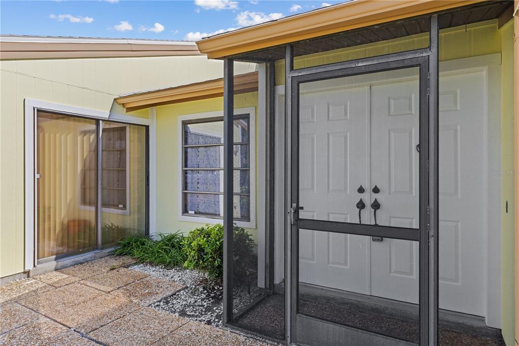 1315 Pine Needle Road Venice, FL 34285 - Photo 2 of 52 a front view of a house