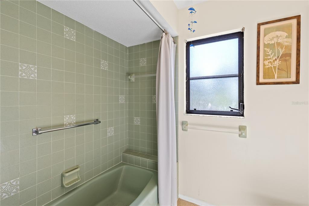 1315 Pine Needle Road Venice, FL 34285 - Photo 22 of 52 a bathroom with a shower