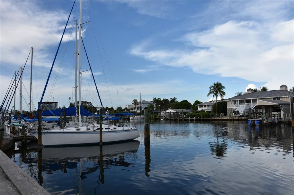 1315 Pine Needle Road Venice, FL 34285 - Photo 46 of 52 a lake view with boat and lake view