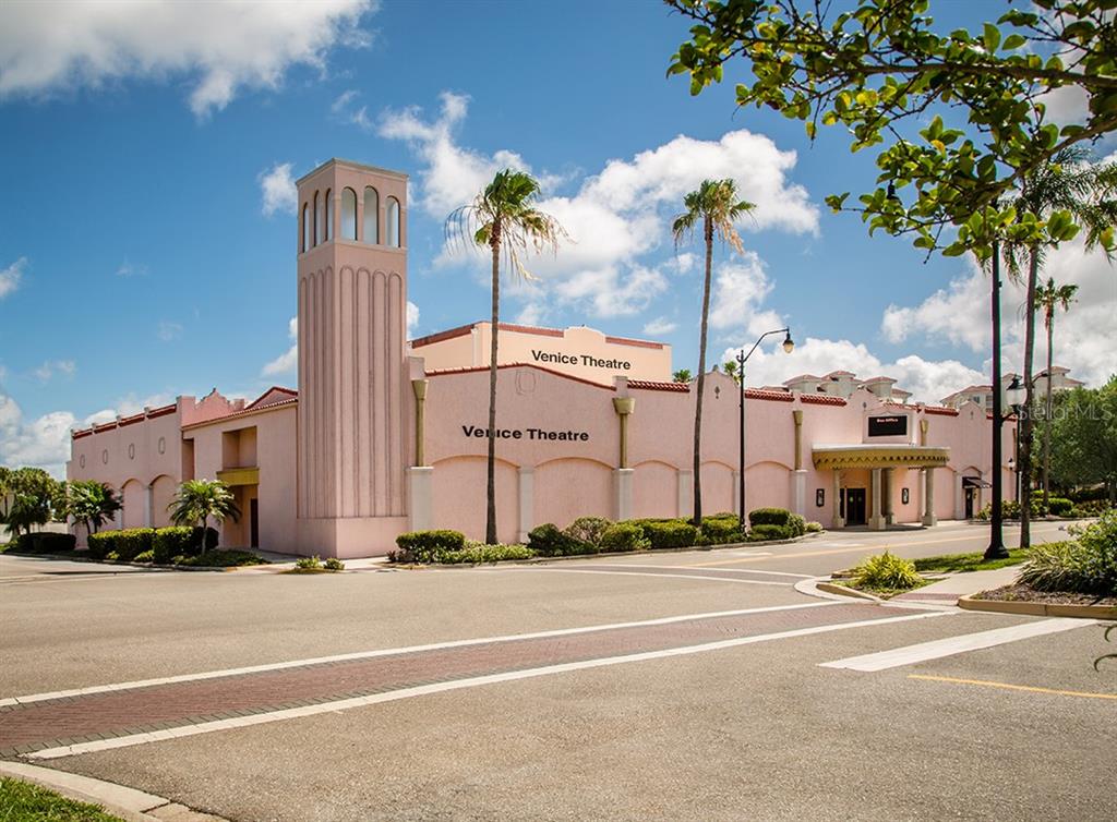 1315 Pine Needle Road Venice, FL 34285 - Photo 50 of 52 a view of a tall building next to a road