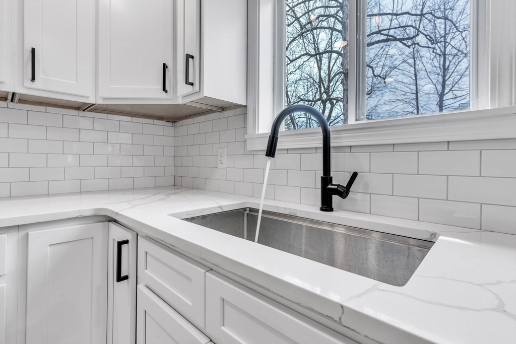74 Ruggles Street Three Rivers, MA 01080 - Photo 19 of 42 a kitchen with a sink and cabinets