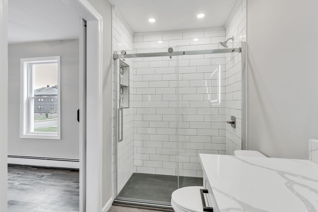 74 Ruggles Street Three Rivers, MA 01080 - Photo 23 of 42 a bathroom with a toilet and a shower