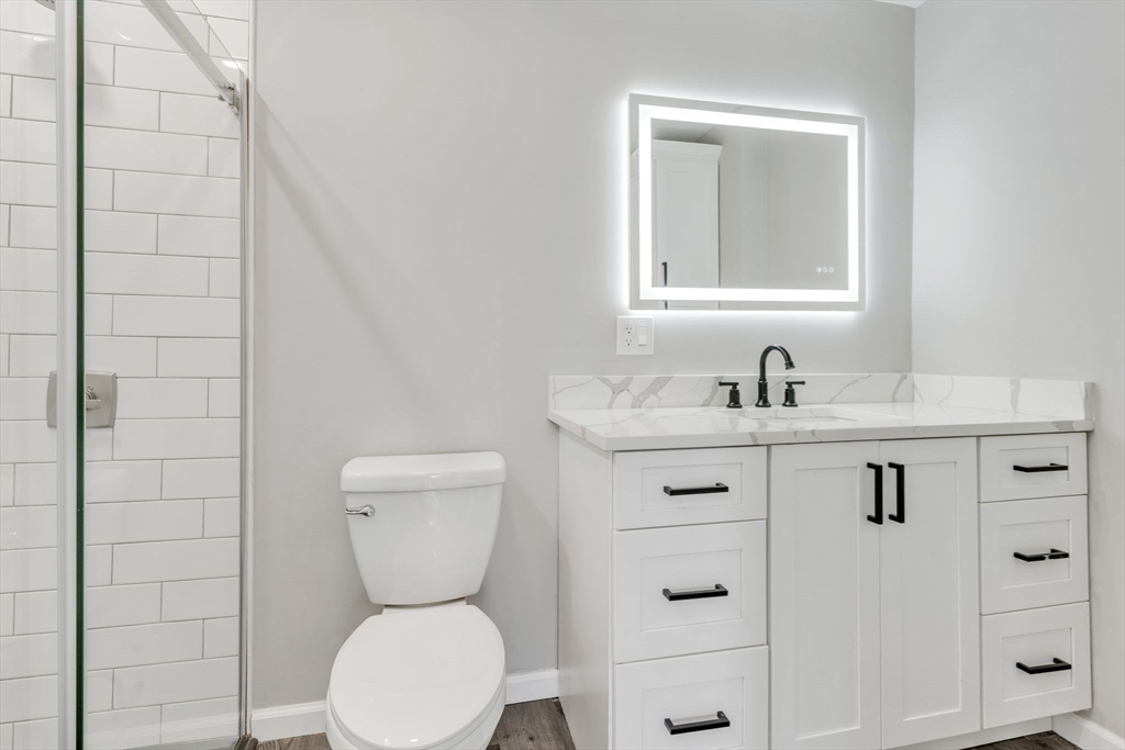 74 Ruggles Street Three Rivers, MA 01080 - Photo 24 of 42 a bathroom with a toilet sink and mirror