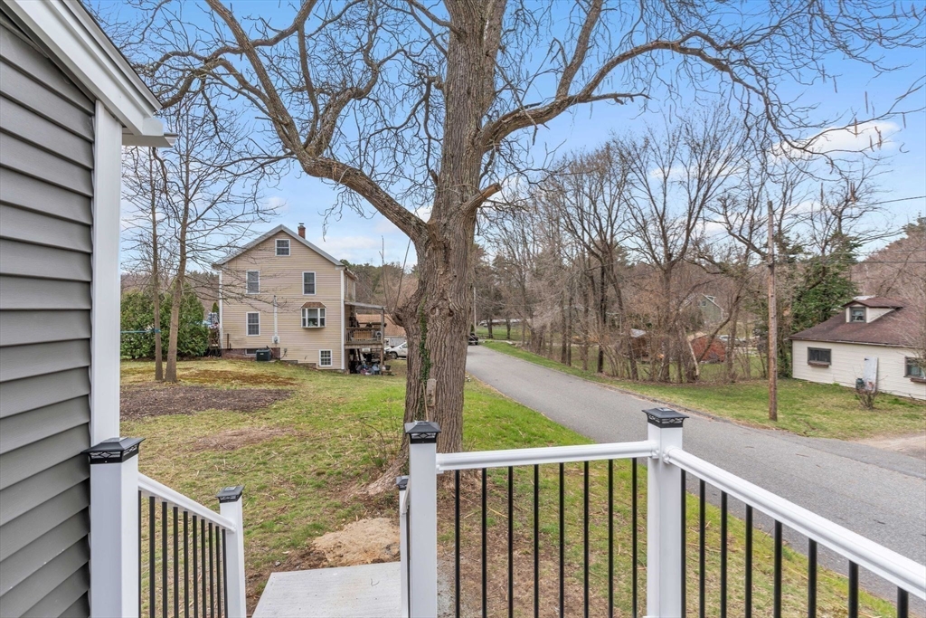 74 Ruggles Street Three Rivers, MA 01080 - Photo 26 of 42 a view of a house with a yard