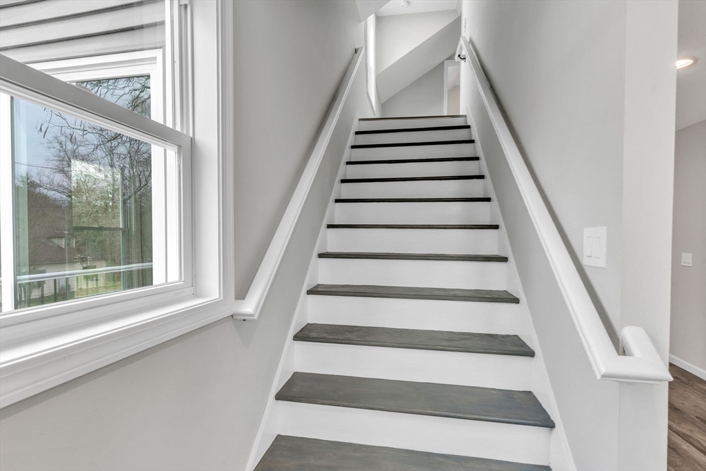 74 Ruggles Street Three Rivers, MA 01080 - Photo 28 of 42 a view of entryway with wooden floor and windows
